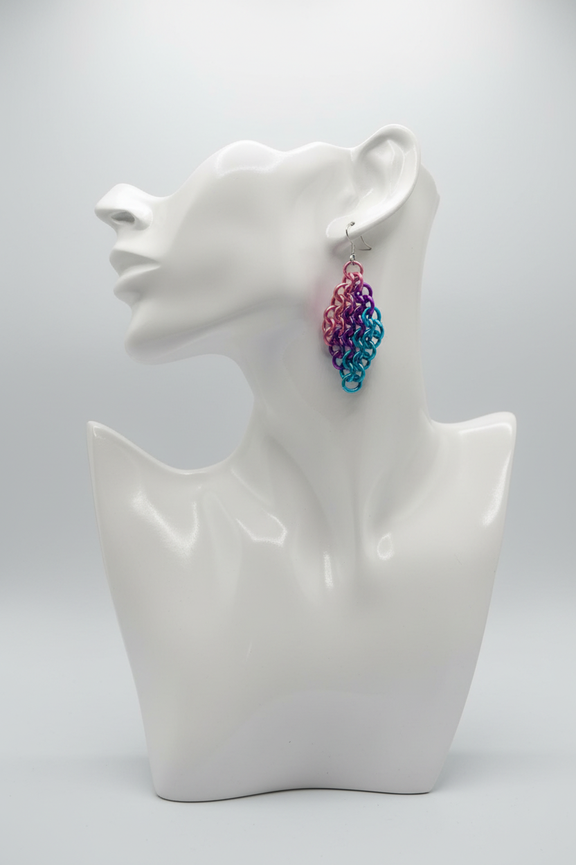 Chainmail earrings on mannequin