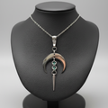 Crescent Moon Spike Pendant on Display Bust