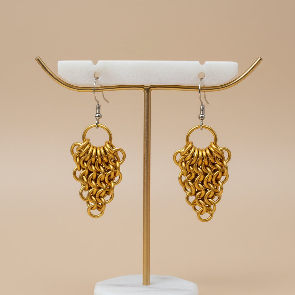 Gold Chainmail Fan Earrings on Display Stand