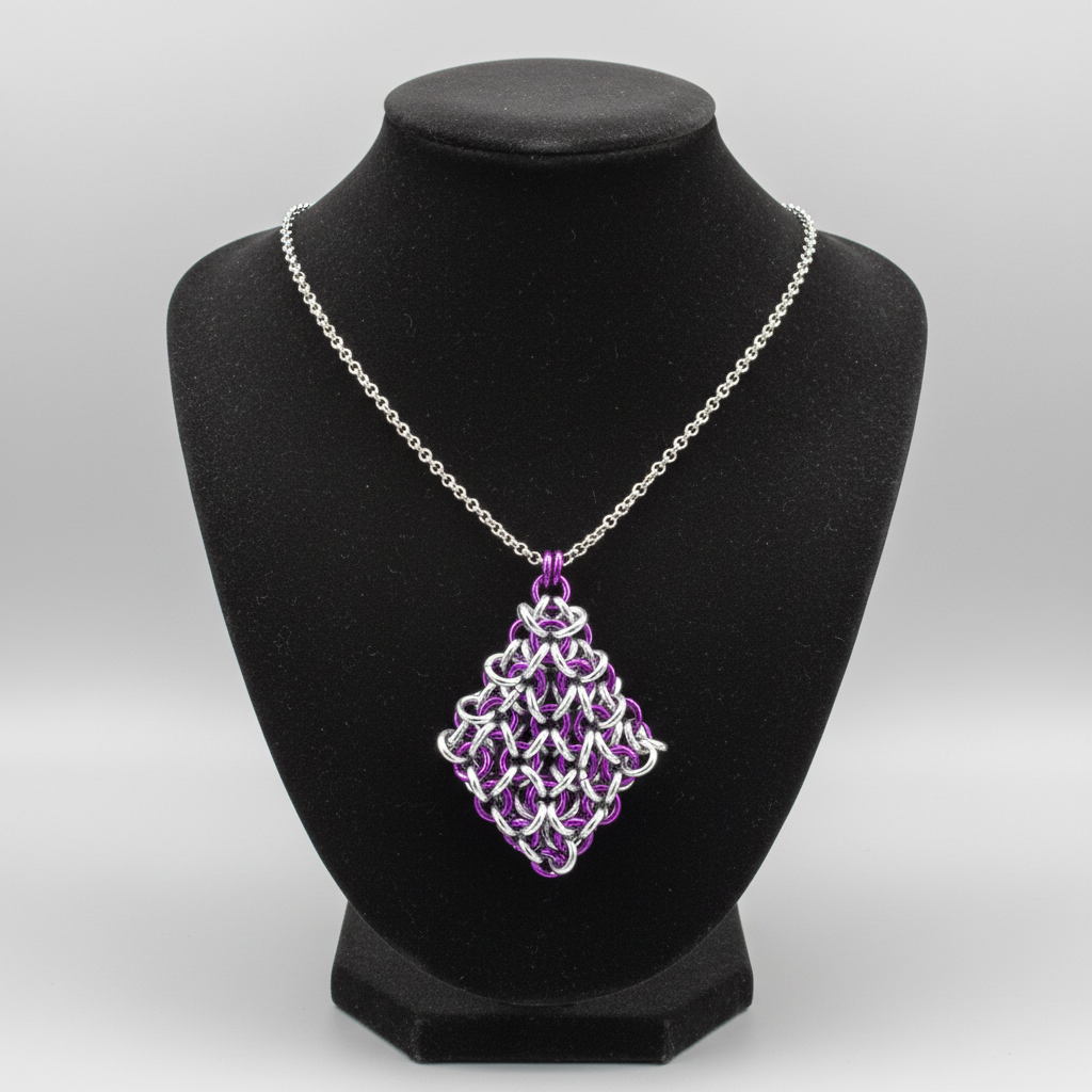 Purple and silver jelly cube fidget chainmail diamond pendant necklace on a jewelry display bust