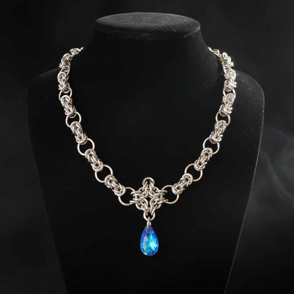 Sapphire Blue Crystal Teardrop Byzantine Chainmail Necklace on Display