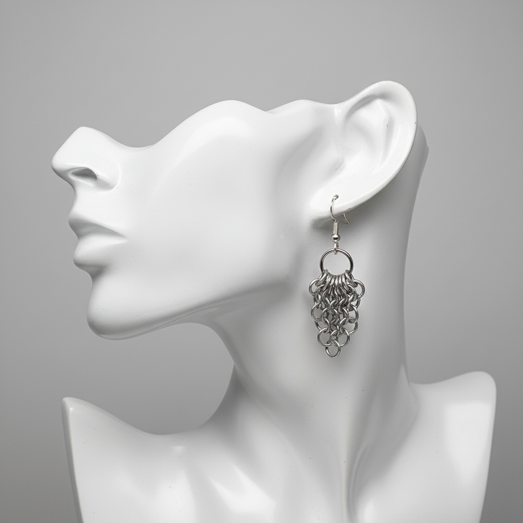 Silver Chainmail Fan Earrings on Mannequin Head